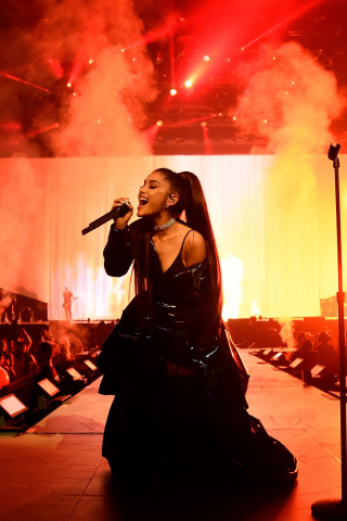 320x480 wallpaper Ariana grande, live performance on stage, singing, 4k