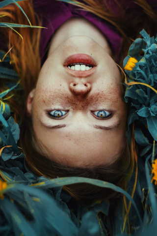 320x480 wallpaper Blue eyes, girl model, flowers, grass, face