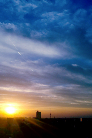 320x480 wallpaper Skyline, clouds, city, sunset