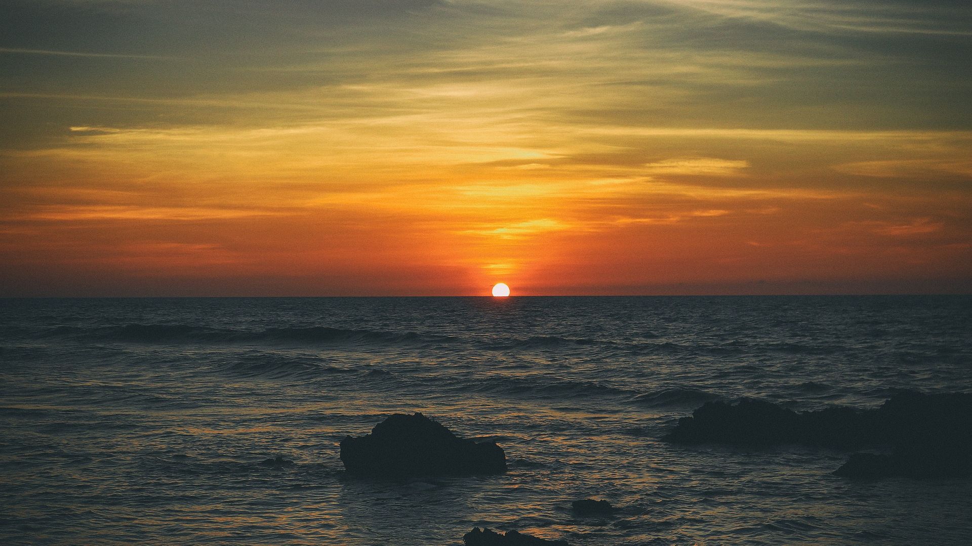 Wallpaper Sea waves, sunset, sun, rocks, skyline