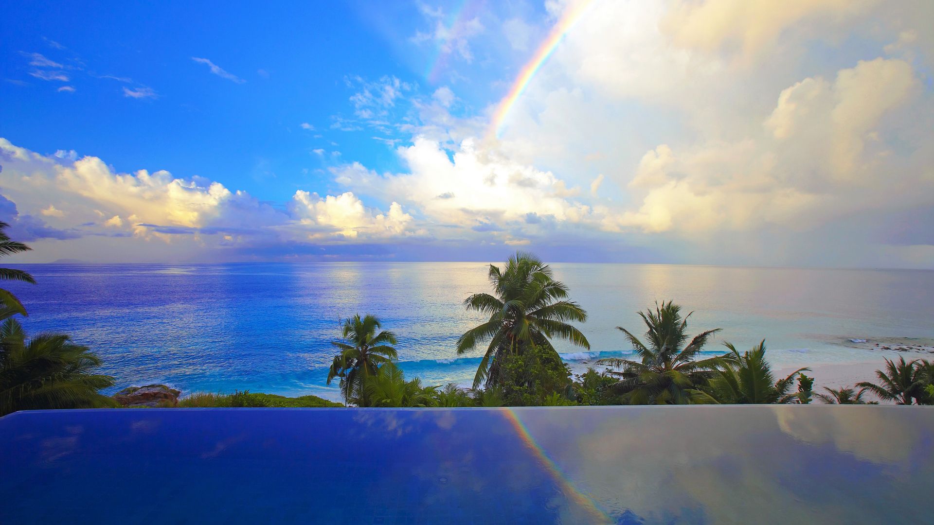 Wallpaper Swimming pool, tropical beach, clouds, sea, palm trees