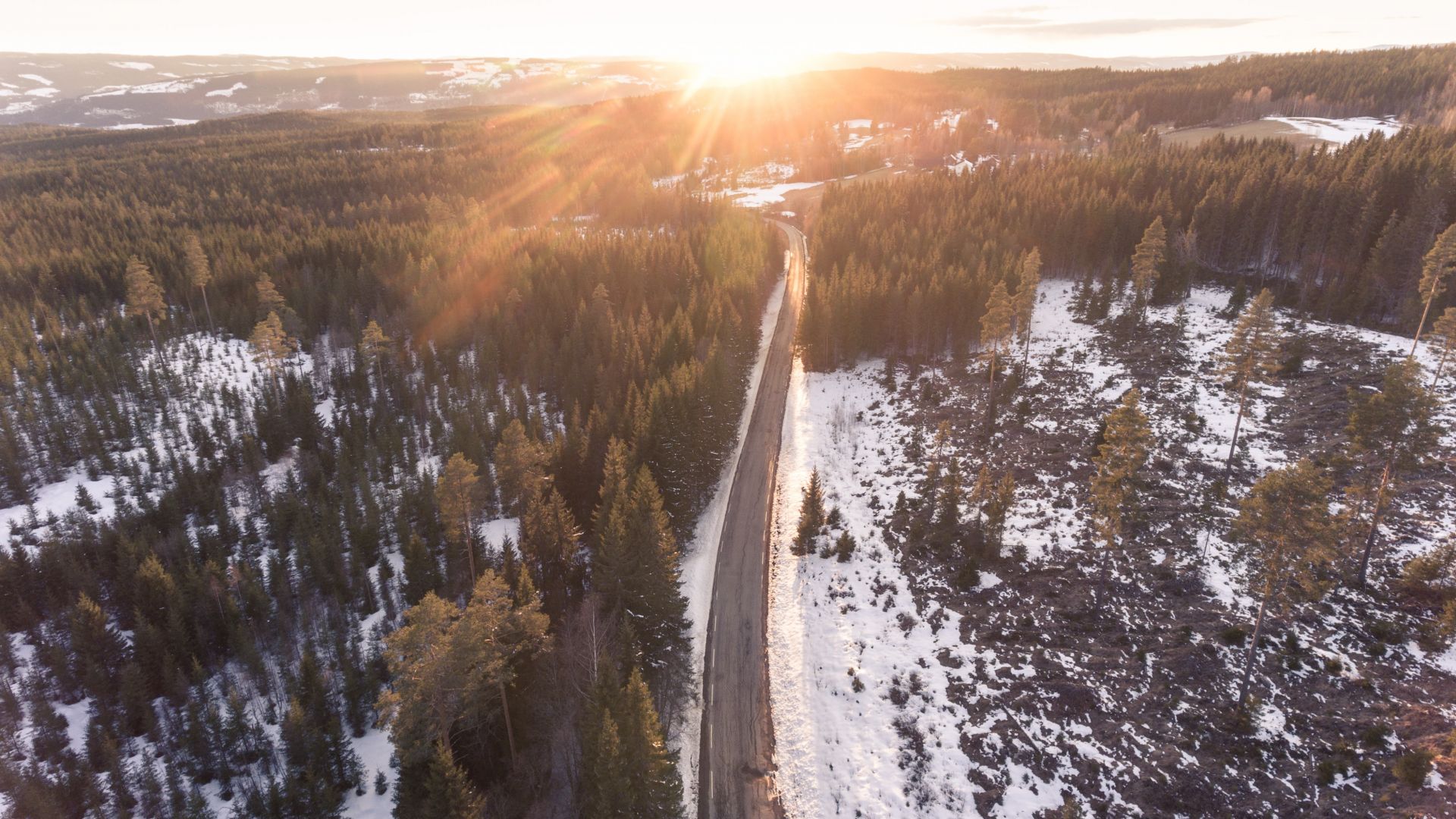Wallpaper Aerial view, road, sunset, forest