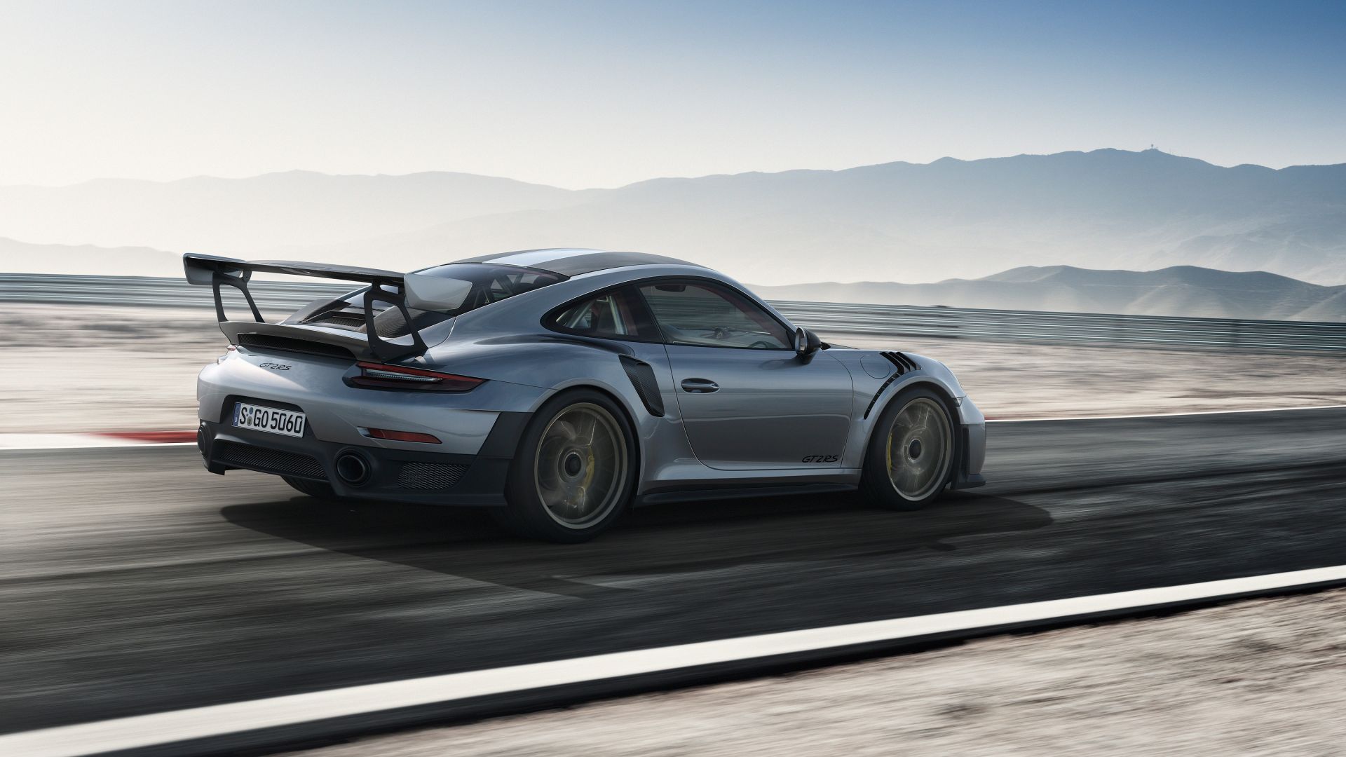 Wallpaper Porsche 911 GT2, road, sports car, blur motion