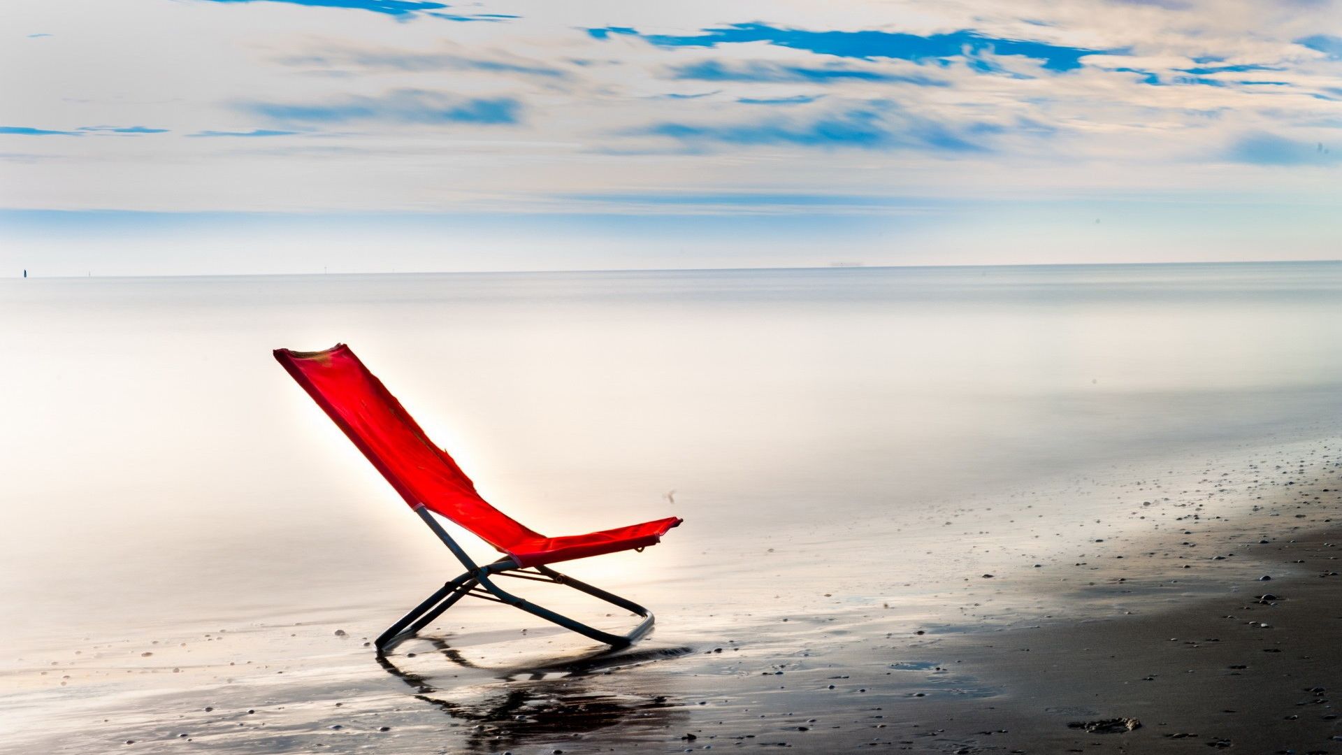 Wallpaper Red Chair at beach