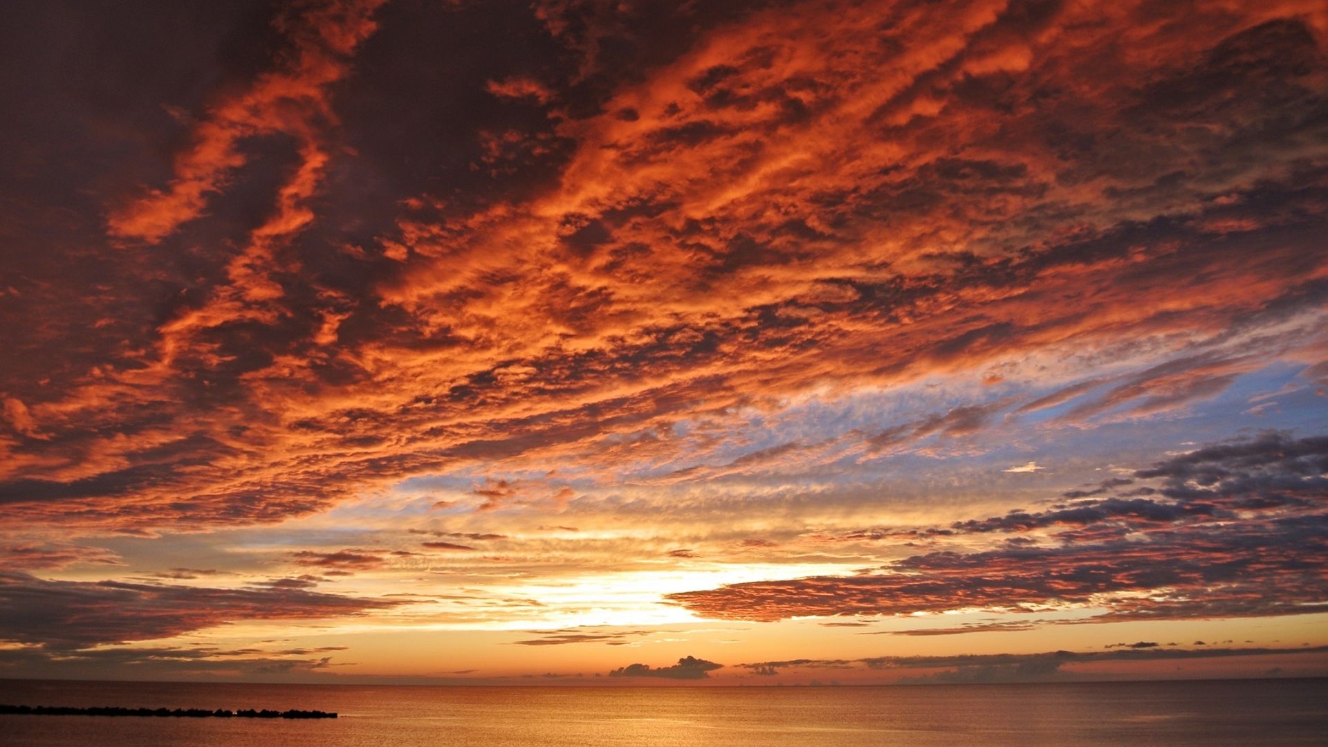 Wallpaper Orange clouds, sunset, skyline, sea