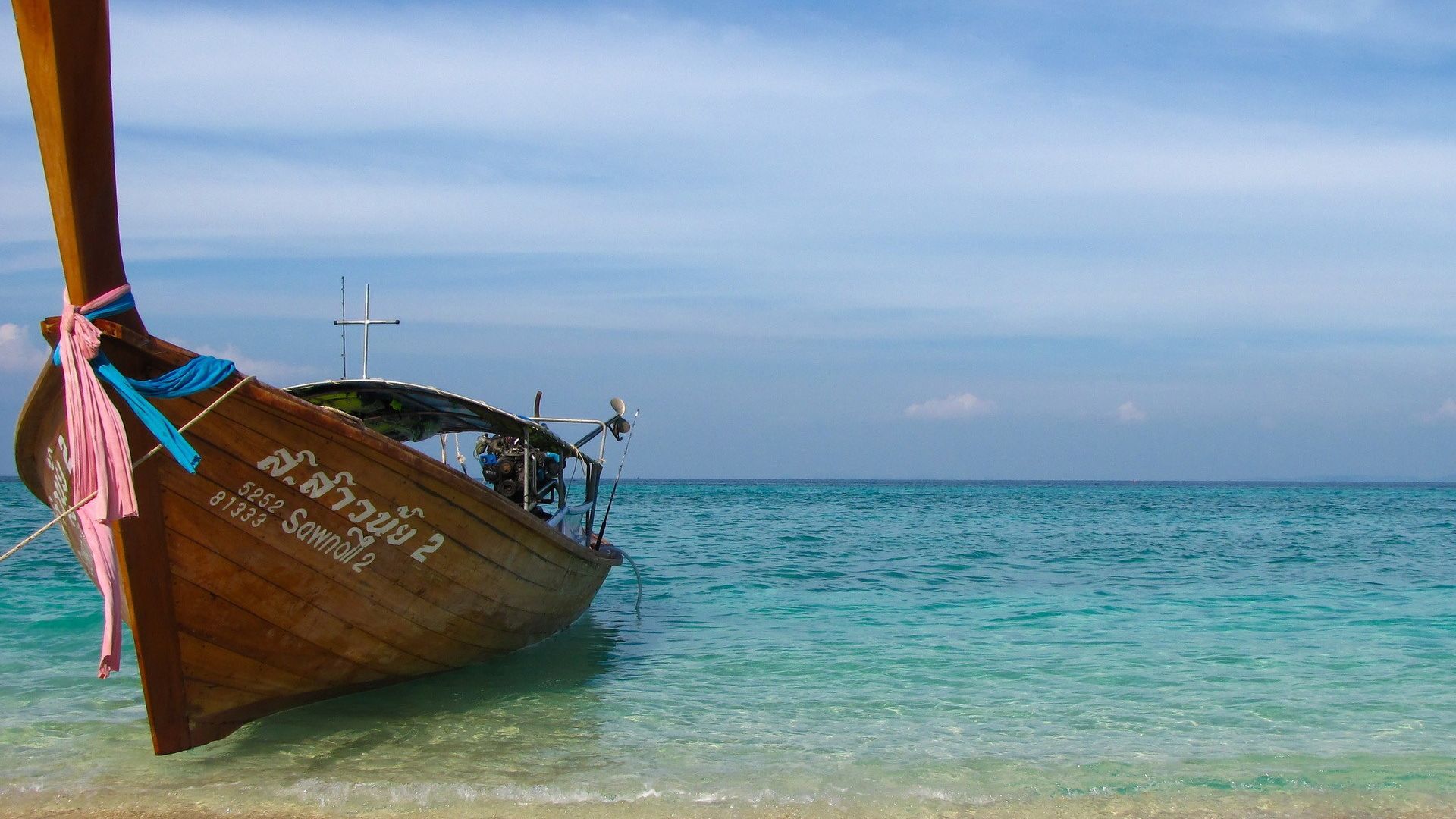 Wallpaper Boat at beach of blue sea