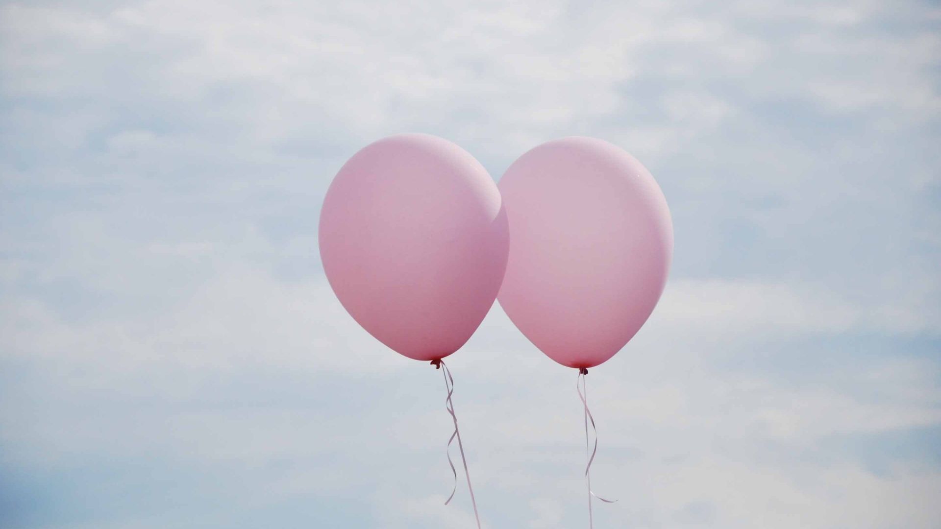 Wallpaper Two pink balloons in air