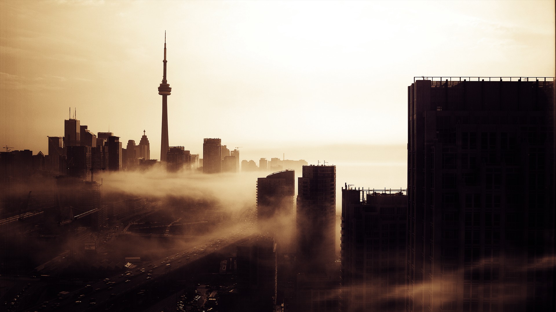 Wallpaper Toronto city's CN tower, sunrise, mist
