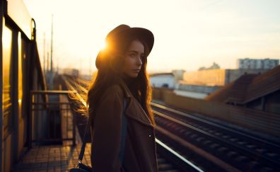 Girl model waiting for train