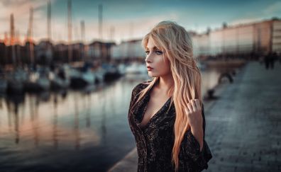 Hot woman, black dress, harbour