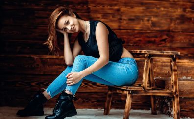 Smiling face, sitting, blue jeans, girl model