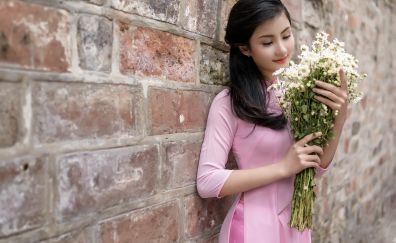 Asian woman with flowers, brunette, beautiful