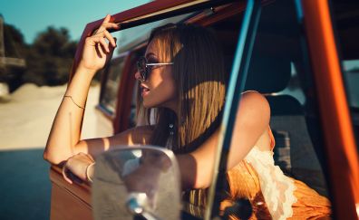 Inside car, looking away, girl model