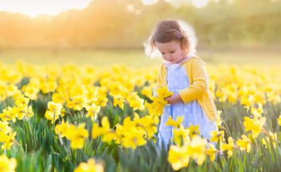 Cute kid, yellow flower farm