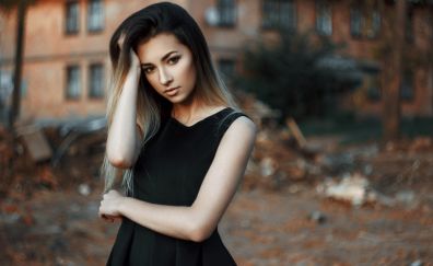 Girl model, beautiful black dress, looking away