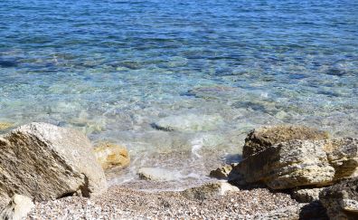 Blue ocean, stones, beach