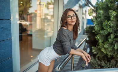 Balcony, girl model, short jeans, glasses