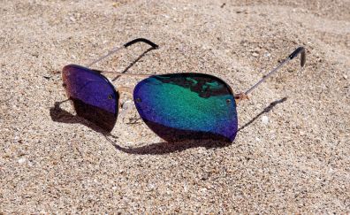 Sunglasses, reflections, sand