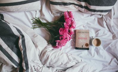 Flowers, book and cup of coffee