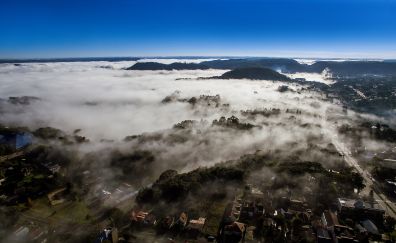 Clouds over city, mist, fog, aerial view