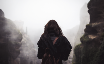 Mountains, traveler girl, mist