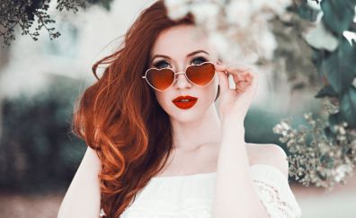 Heart shape sunglasses, red head, model