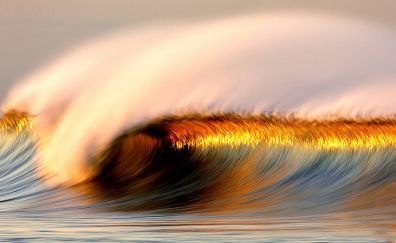 Sea waves look great in sunlight of sunset