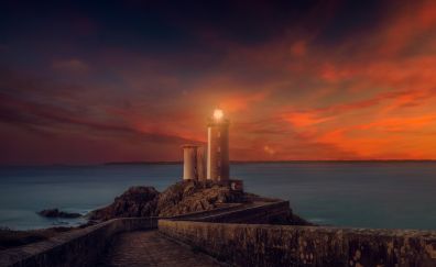 Lighthouse sunset scene