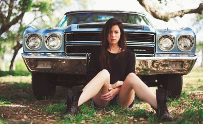 Beautiful girl and classic car