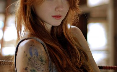 Cute girl with tattoo