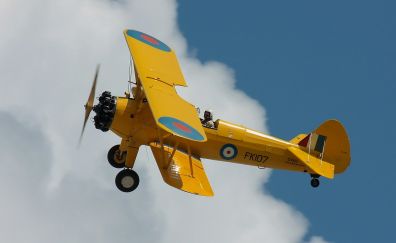 Yellow aircraft, sky
