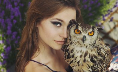 Brunette girl with owl bird
