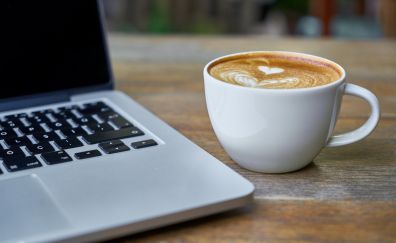 Laptop, keypads, coffee cup