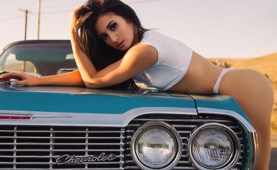 Girl model with Chevrolet Impala car