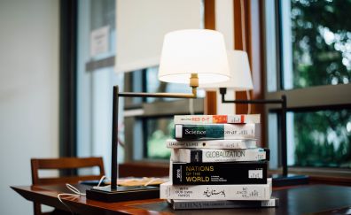 Books, table, lamp