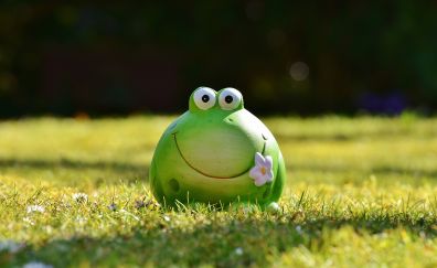 Frog toy, grass field, funny