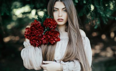 Beautiful model with rose flowers