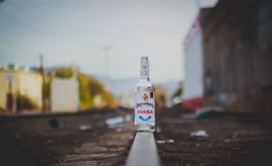 Vodka bottle on railroad